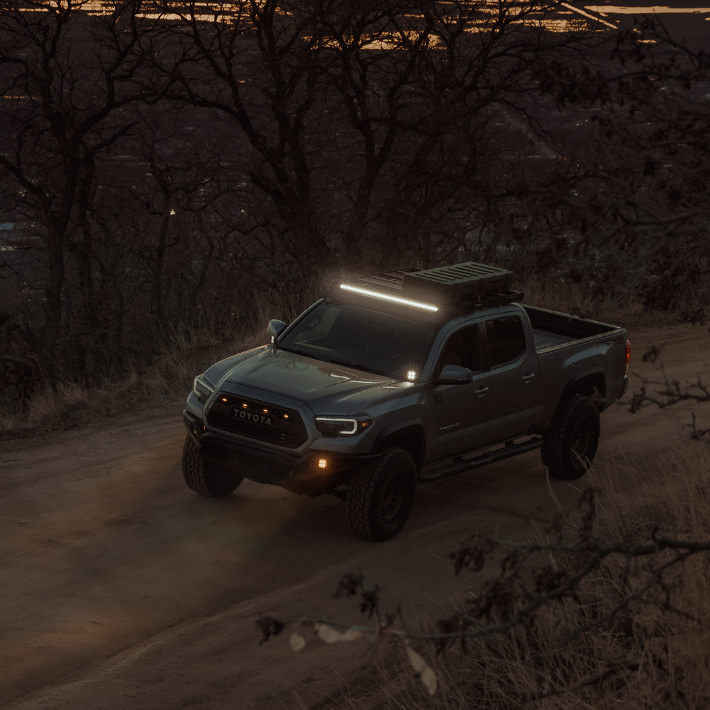 quattro led pod light mounted on a toyota tacoma as a fog light